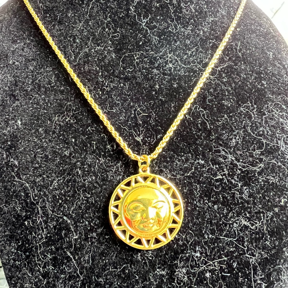 Sugar Blossom gold-tone  pendant necklace. “ Live by the sun, love by the Moon”